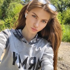 Мила