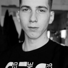 Николай
