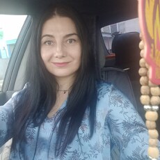 Мила