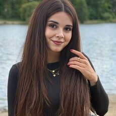 Мила