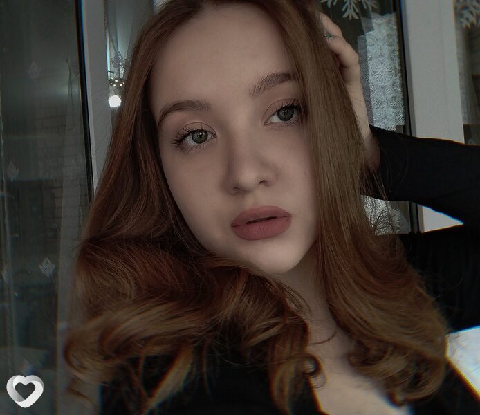 Оля