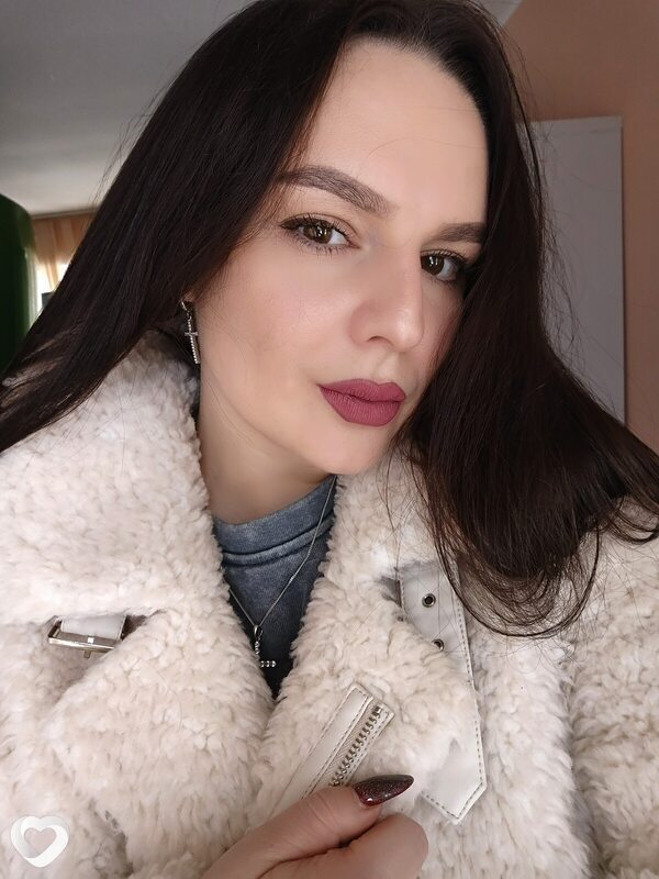 Мила