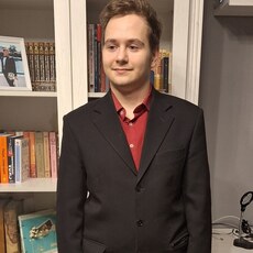 Николай