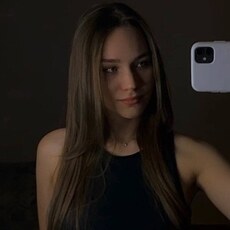 Оля