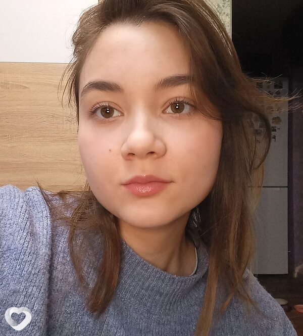 Оля
