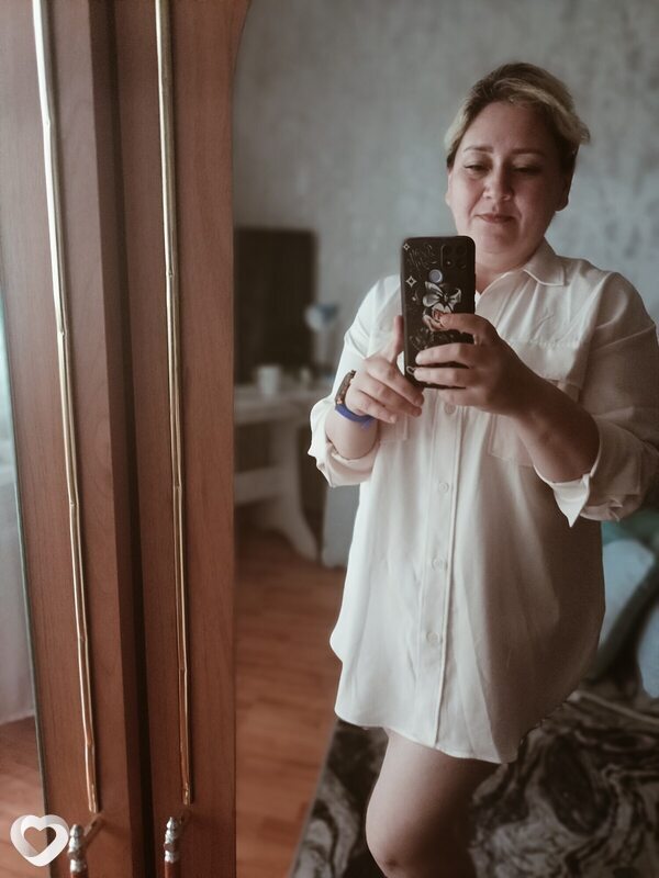 Мила