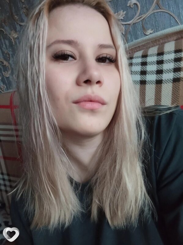 Оля