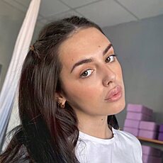 Оля