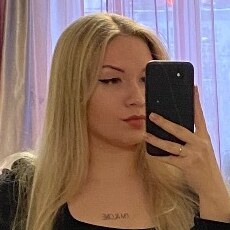 Оля