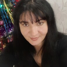 Мила
