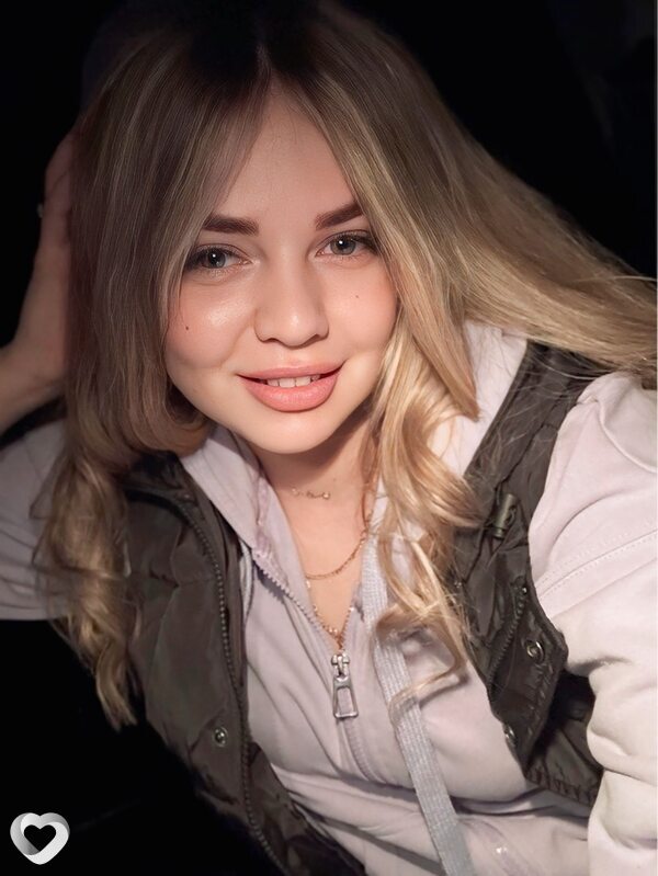 Мила